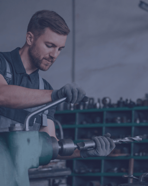 Man using bolt to work on machinery