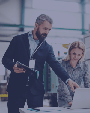 Managers scheduling a warehouse inspection